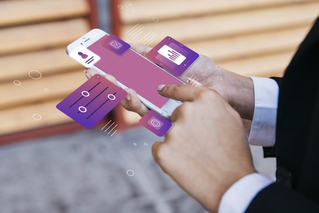 Como usar a conta digital para organizar melhor suas finanças? 9 Pessoa interagindo com uma conta digital por meio de um smartphone, com elementos gráficos flutuantes representando funcionalidades como controle de gastos, segurança, perfil do usuário e configurações, simbolizando a praticidade e tecnologia dos serviços bancários online.